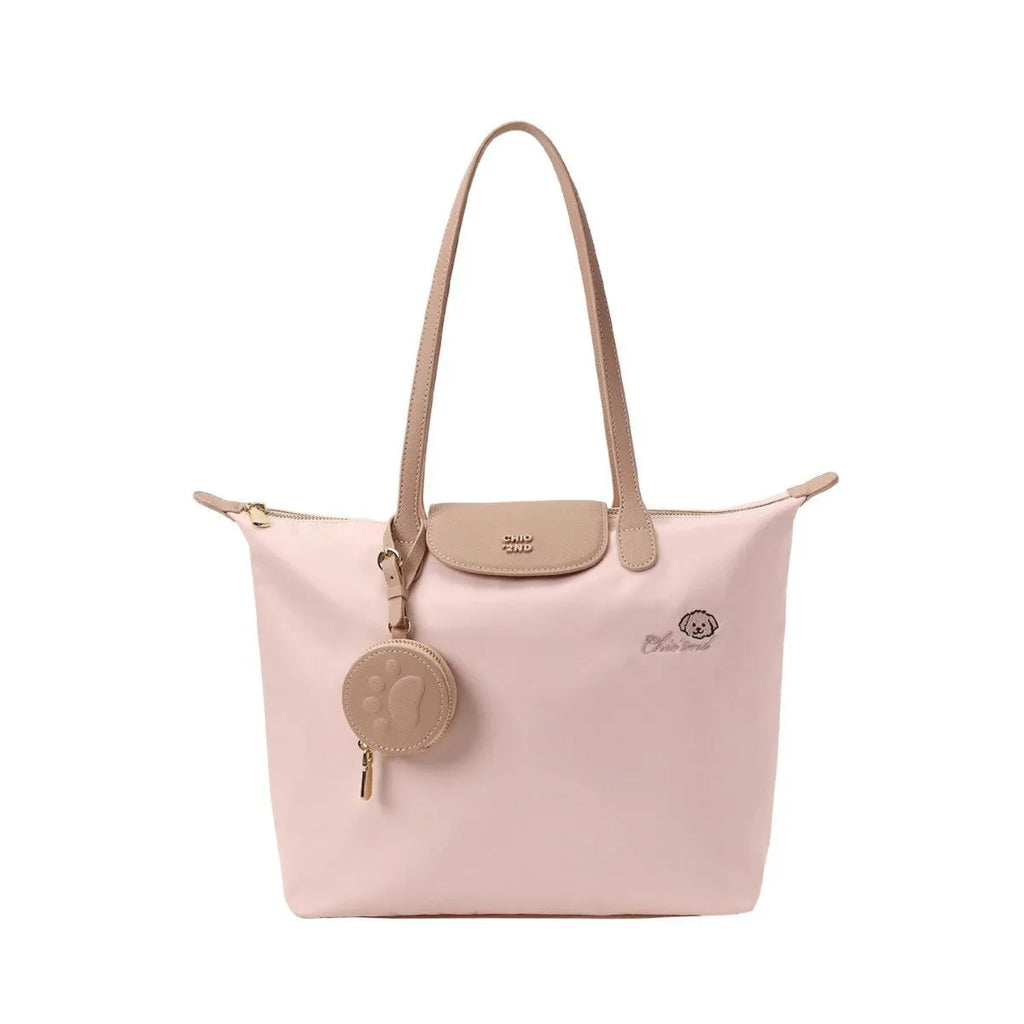 Pink Oxford cloth tote bag with sandwich pocket and shoulder strap showing sewing thread detailing