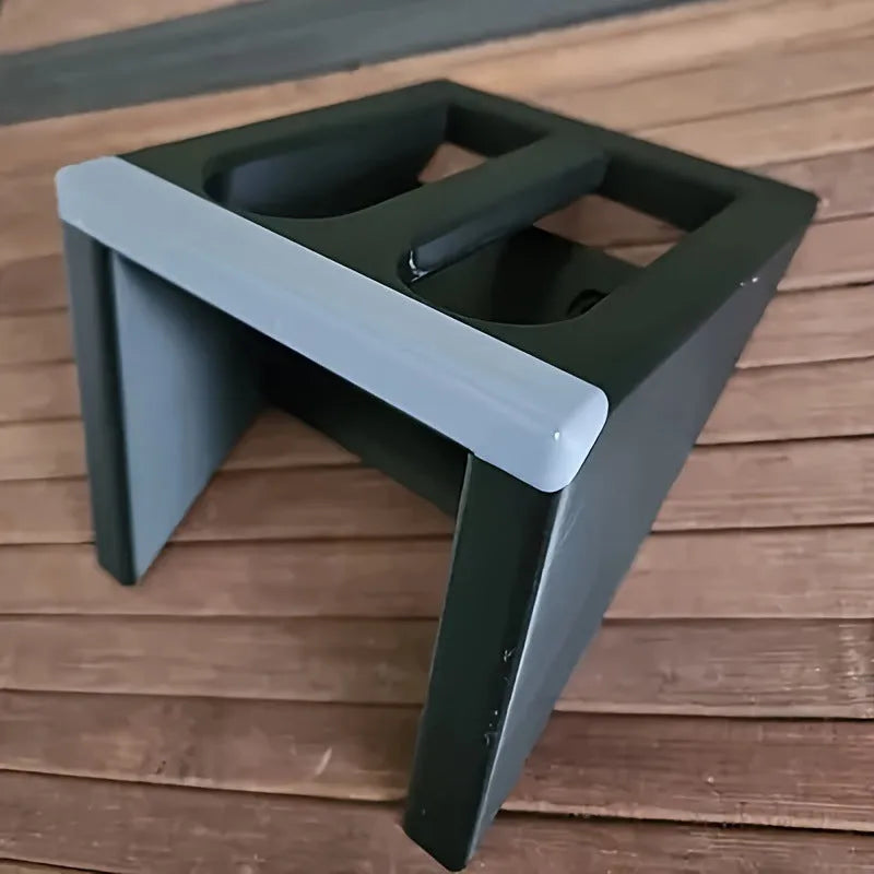 Black plastic pistol stand for displaying collectible firearms, dimensions 10.85 x 7.6 cm