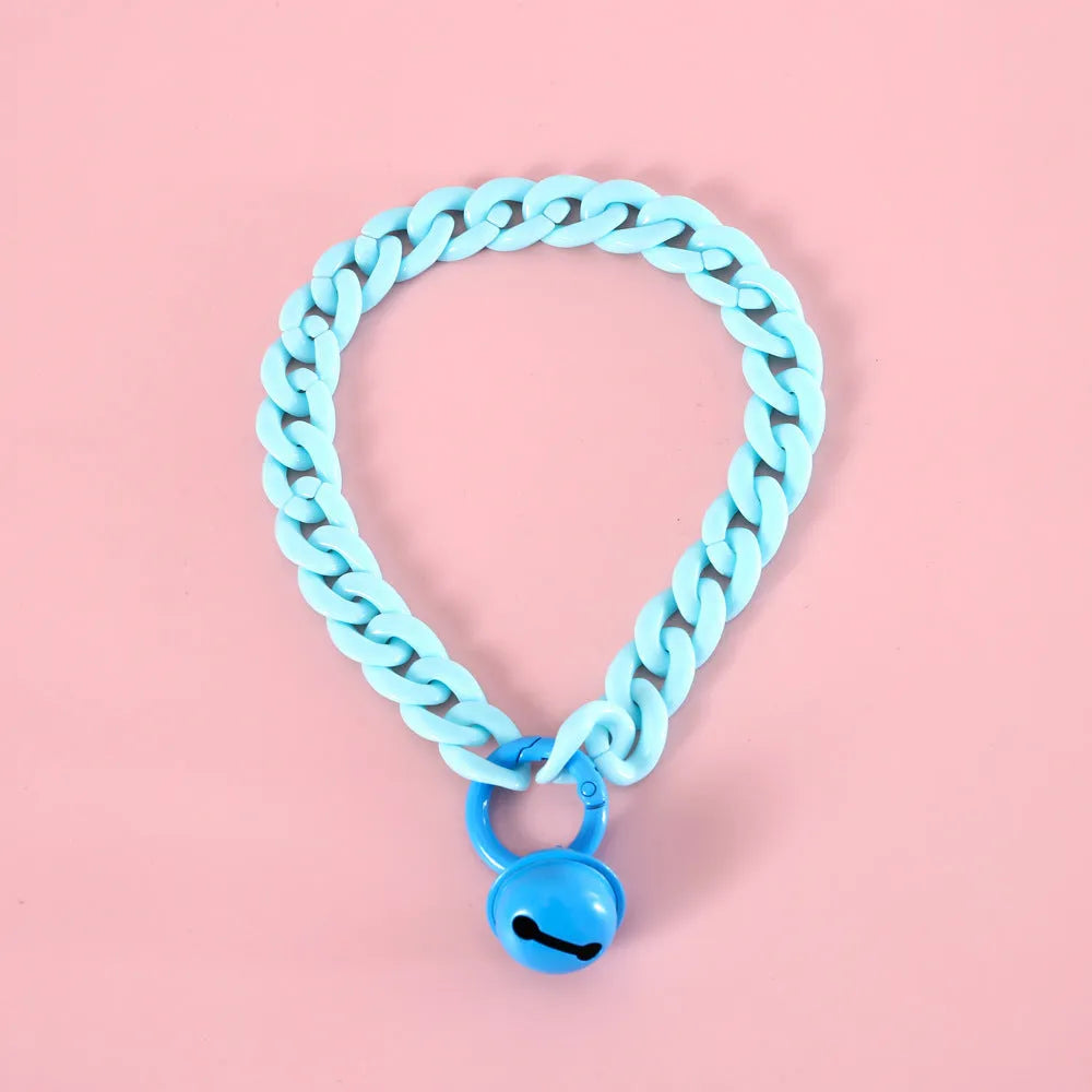 Adjustable pet collar in macaron candy colours with plastic construction and monochrome pattern