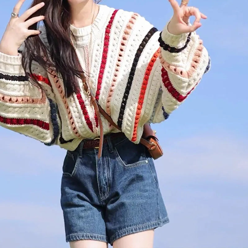 Rainbow striped pullover sweater with batwing sleeves and hollow knit texture