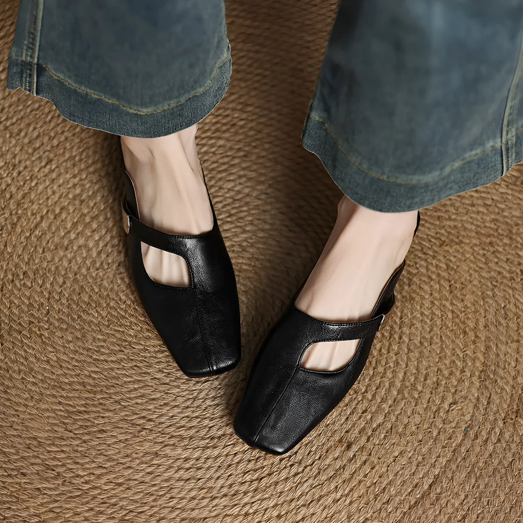 Square head outdoor slippers with low heel in black colour showing artificial PU upper and rubber sole