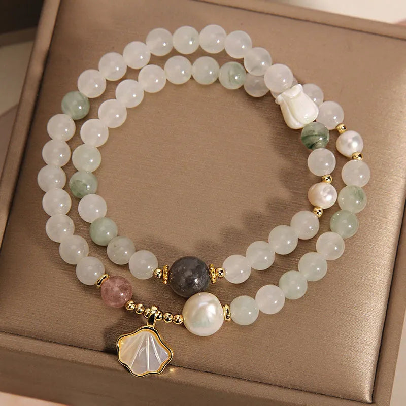 Crystal bracelet with Tianshan jade shell ginkgo leaf pendant and gold-plated gemstone settings