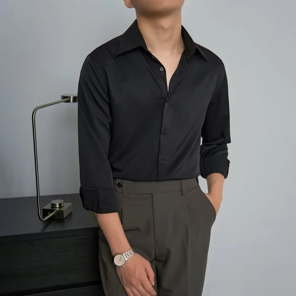 Man wearing a black loose-fit long sleeve cardigan shirt in Korean slim style with Japanese retro details.