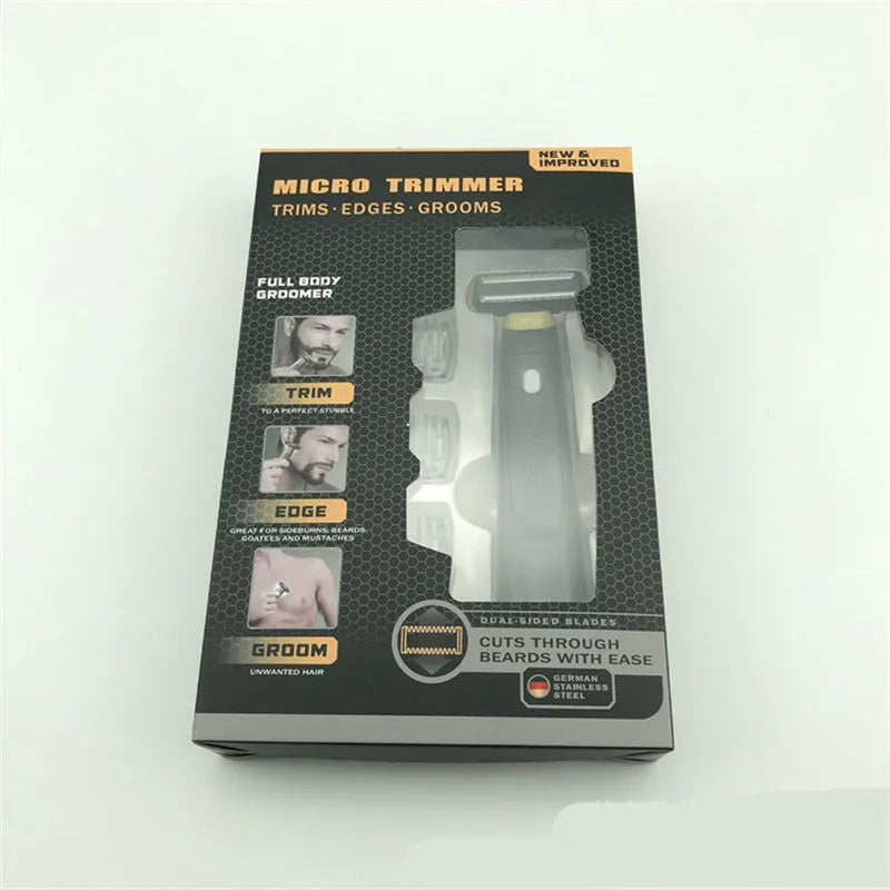 Black wireless rechargeable precision shaver with stainless steel blades, measuring 15cm long with ergonomic handle
