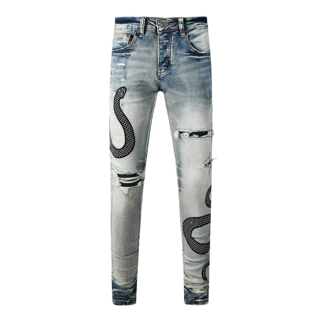 Blue distressed skinny jeans with a button fly on a mid-rise waist.