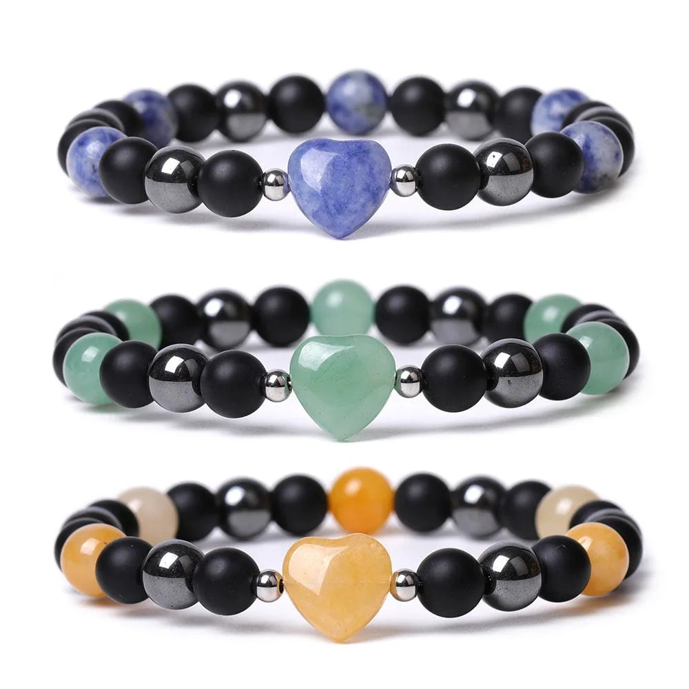 Hand-cut geometric peach heart bracelet in Tigereye stone with cosmic moon and planet elements