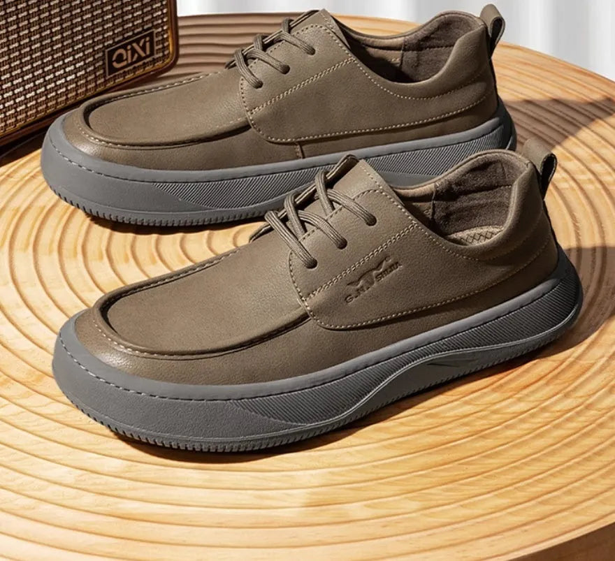 Brown retro leather casual shoes with big toe design and visible stitching on a rubber sole.