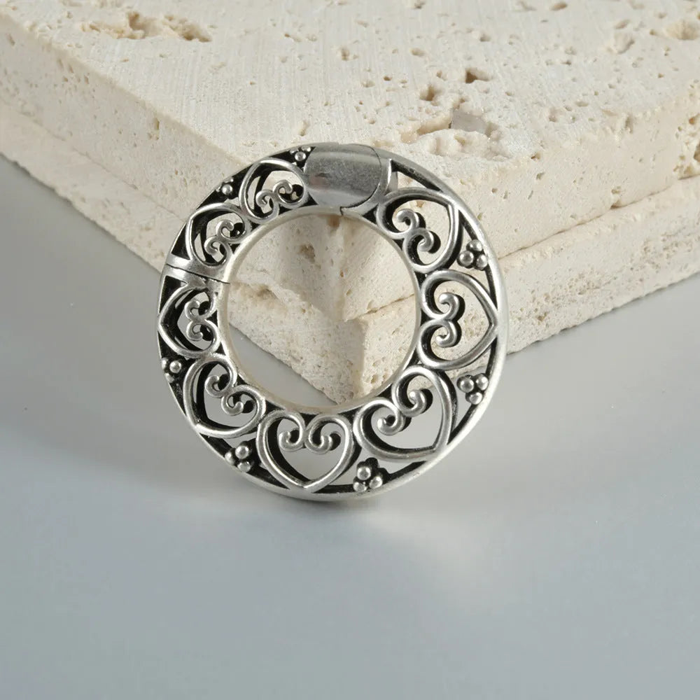 Retro geometric magnetic earrings with hollow heart and lotus shapes in polished stainless steel