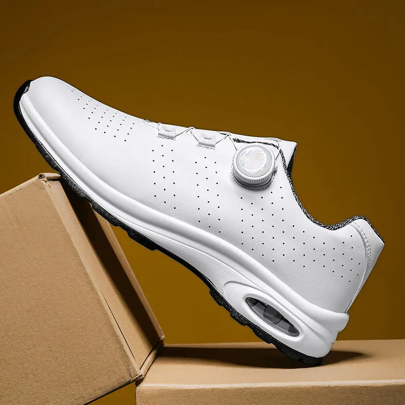 Low-top casual shoes in black with mesh upper, composite sole, and lace-up front closure on a neutral background