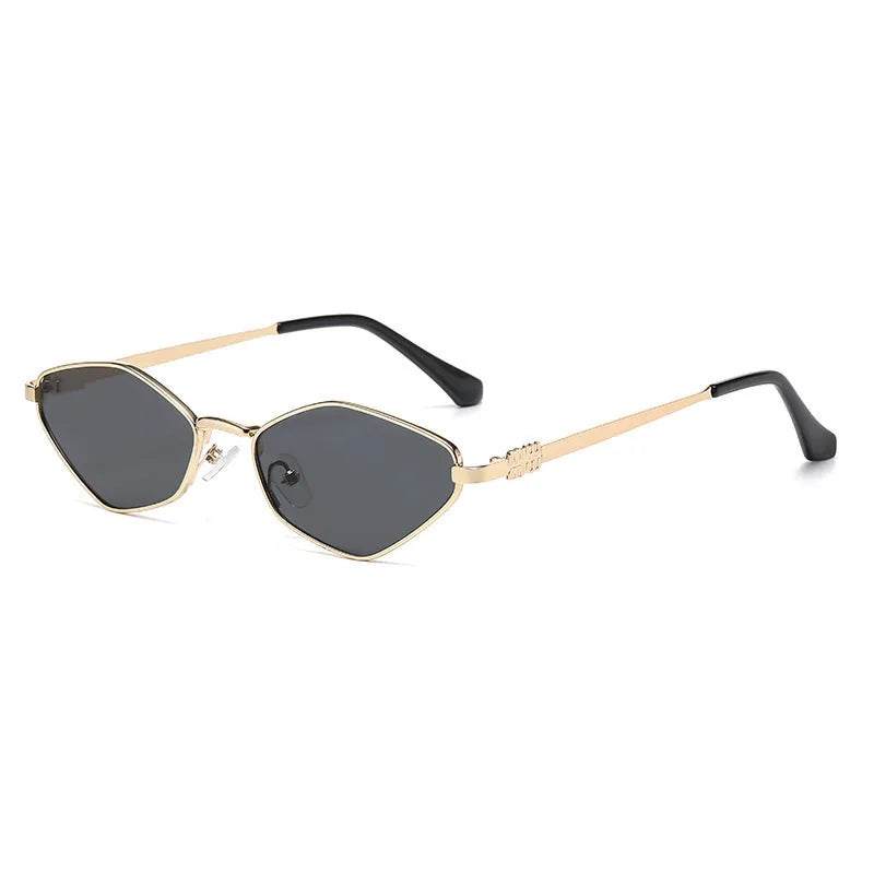 Small cat eye sunglasses with metal frame and rhombus temple design in gold with grey lenses