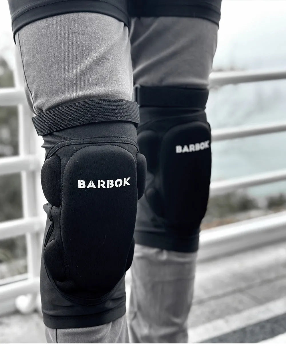 Black skating hip protection pants with integrated NBR foam pads for impact absorption during falls