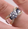 Women's two-tone geometric fashion ring in brass with white steel plating.