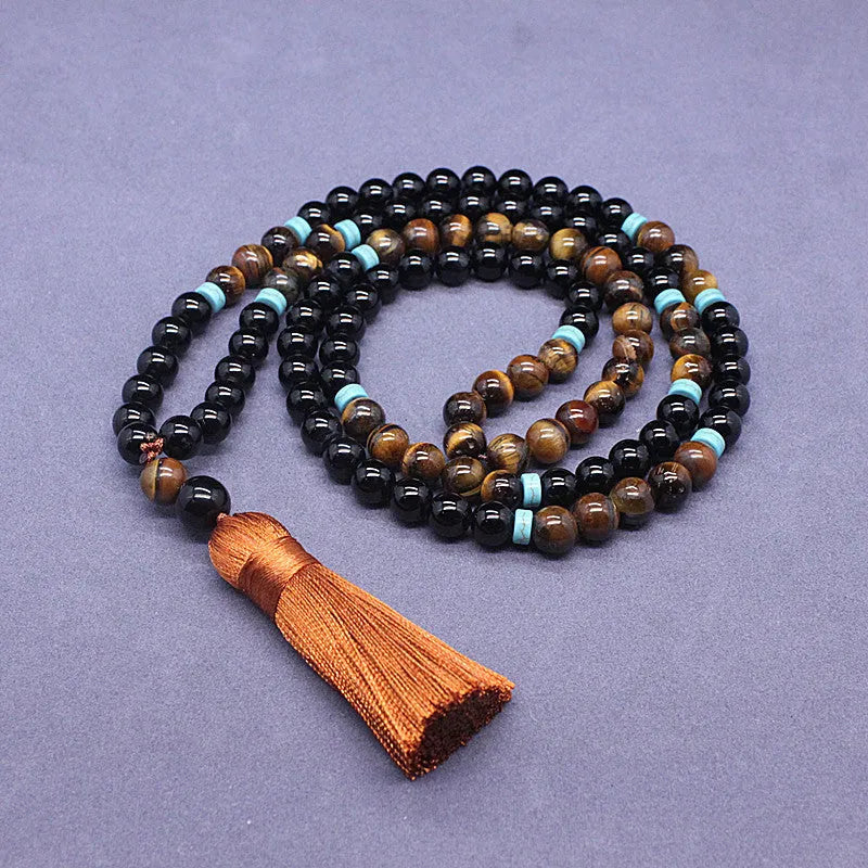 Black agate bracelet and matching necklace with tiger-shaped Tiger's Eye stones in geometric European-American design