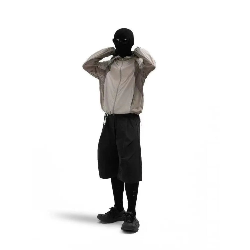 Mesh-stitched nylon sun protective clothes in desert brown, available in sizes M to 2XL.
