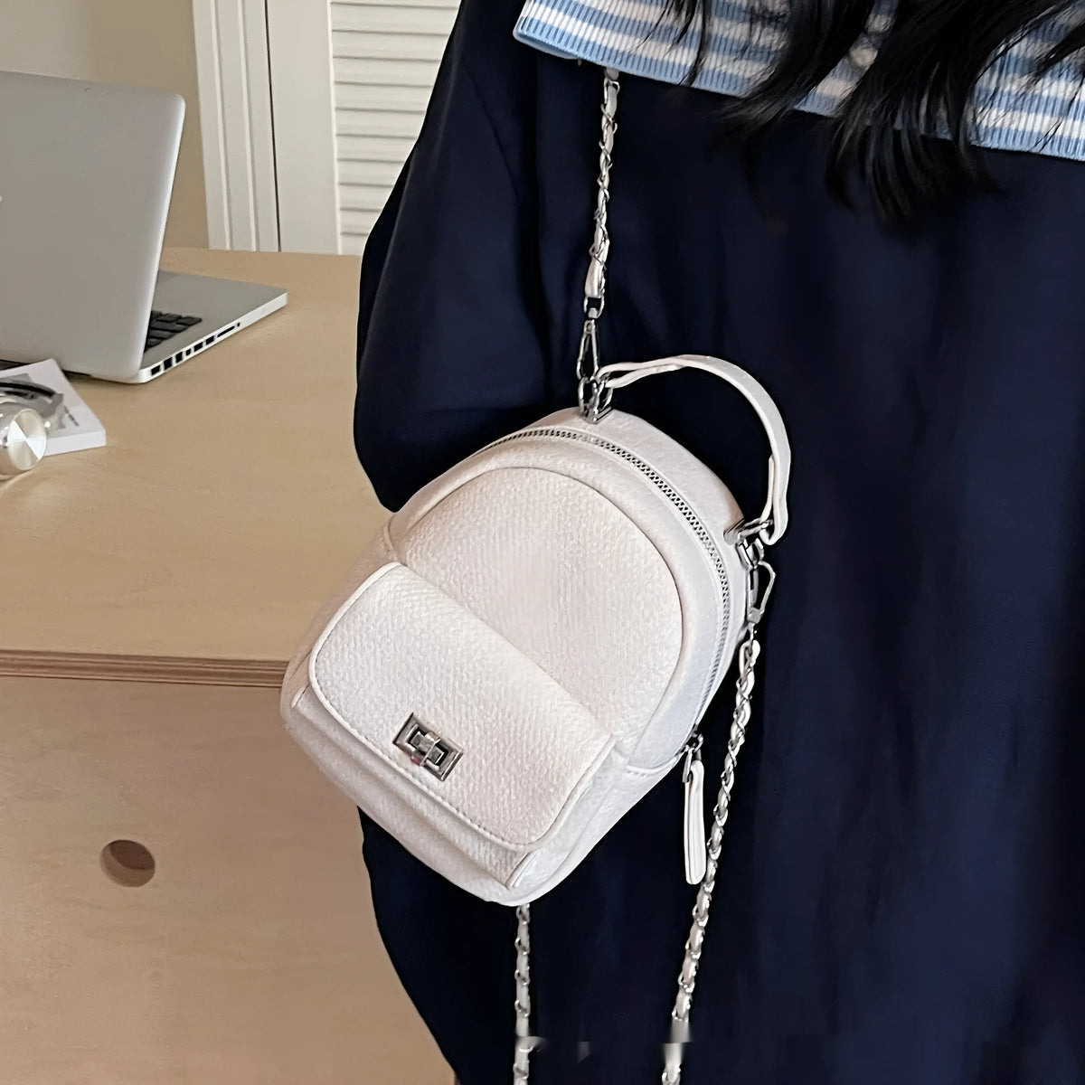 Korean style solid colour PU casual backpack with three-dimensional pocket, shown in black, beige, blue, dark blue or khaki.