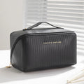 Vertical pattern cubic makeup bag in beige, black, brown, grey, or pink with 22.5cm dimensions