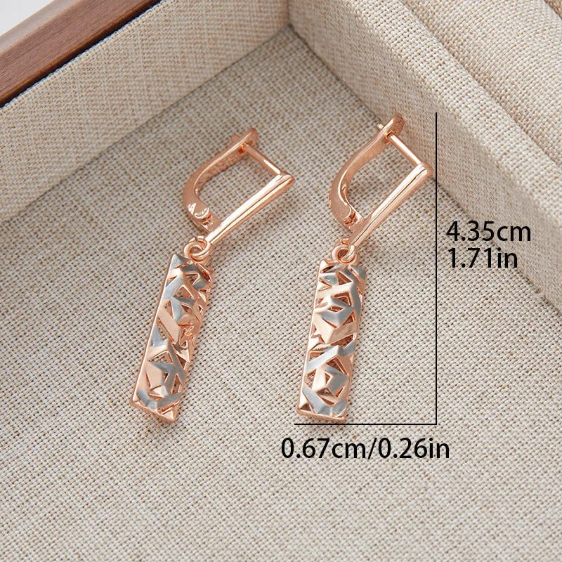 Rectangular two-tone hollow stud earrings for women with a geometric electroplated alloy design.