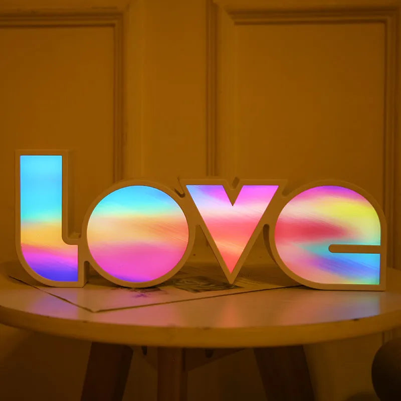 Valentine's Day LED LOVE light with rainbow-style plastic shade, measuring 35.5cm, for romantic room decor