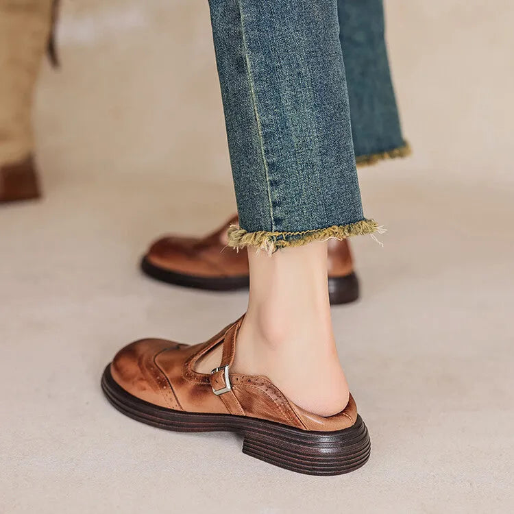 British style women's flat leather shoes with round toe in black and brown colour options