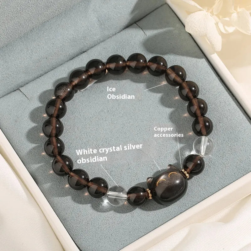 Women's silver stone bracelet with detailed opal cat head charm and 8mm setting