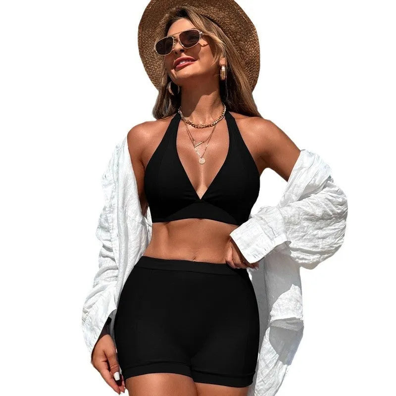 Split women's swimsuit bikini in black, pink, purplish blue, or sapphire blue with sleeveless design for swimming and wading