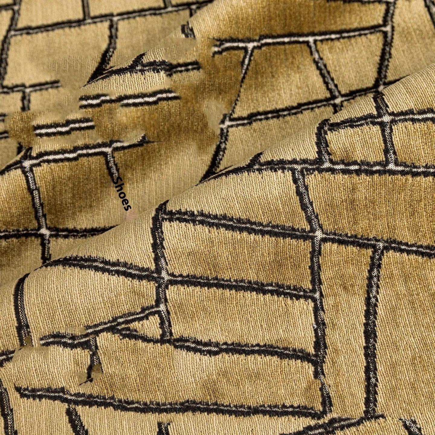 Tuhao gold geometric abstract pillow in 50x50cm size with feather velvet texture on a sofa
