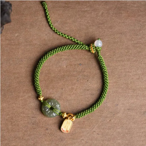 Hand-woven corn knot bracelet with Hetian jade safety buckle on green flexible wire