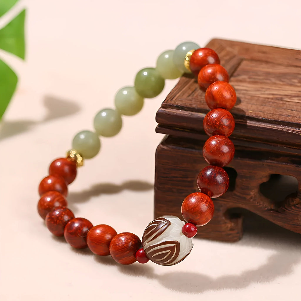 Women's red rosewood and grey jade bracelet with eight 12mm Bodhi lotus seed beads in Chinese style.