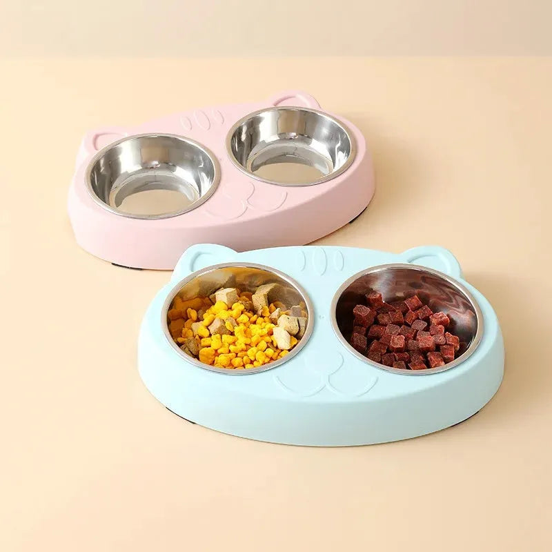 Blue plastic pet feeder with two bowls measuring 26.5cm by 17cm for food and water