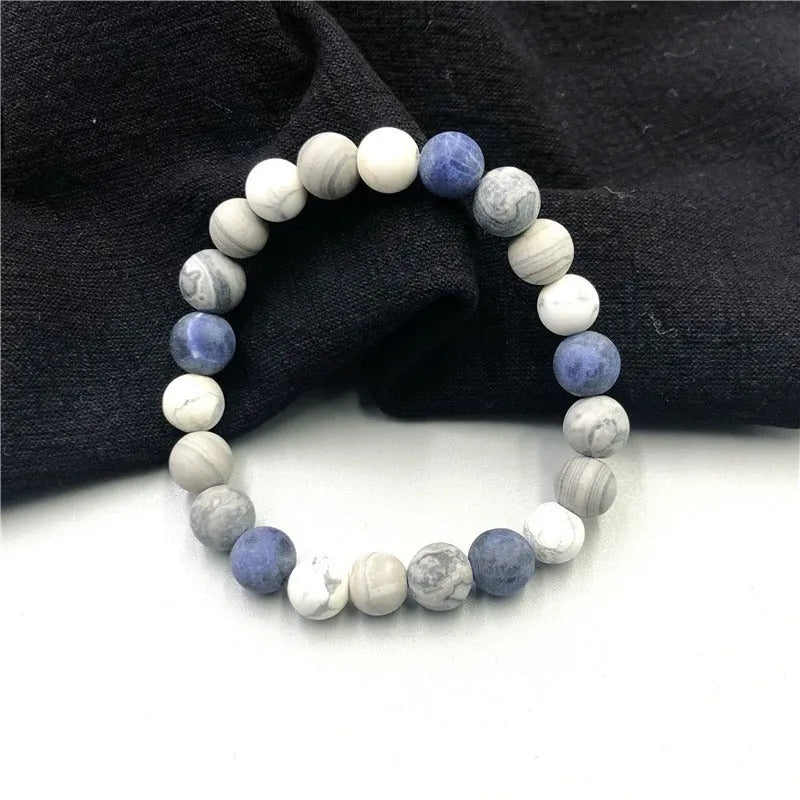 Handmade planet stone bracelet with universe wind pattern showing U-shaped design