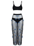 Black women's bikini set with butterfly embroidery showing top, underwear and pants pieces