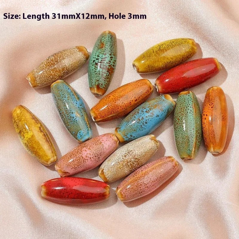Ceramic jewellery making beads in eight colours including pink, yellow, blue, red, coffee, green, orange and mixed