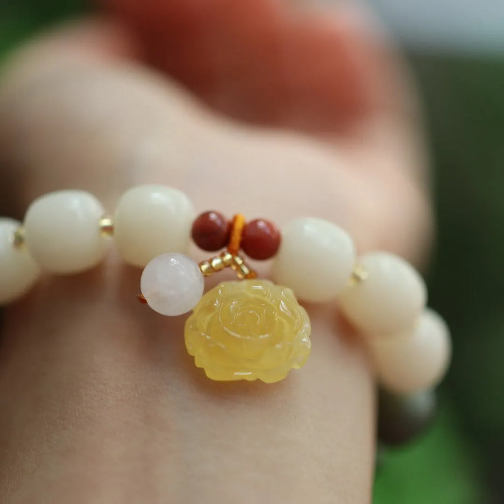 Gradient white jade bodhi bracelet with beeswax lotus pendant, 10mm flower beads