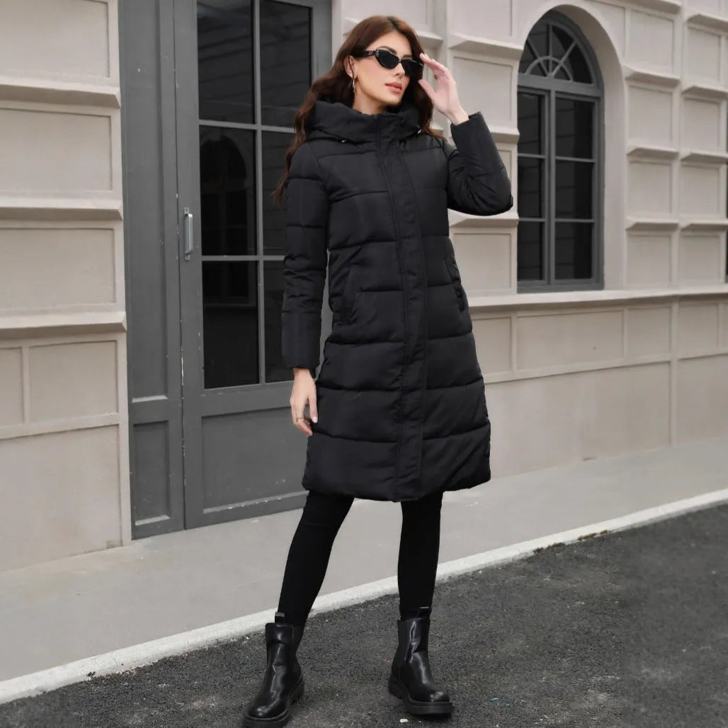 Black hooded slim fit winter jacket with long sleeves on man
