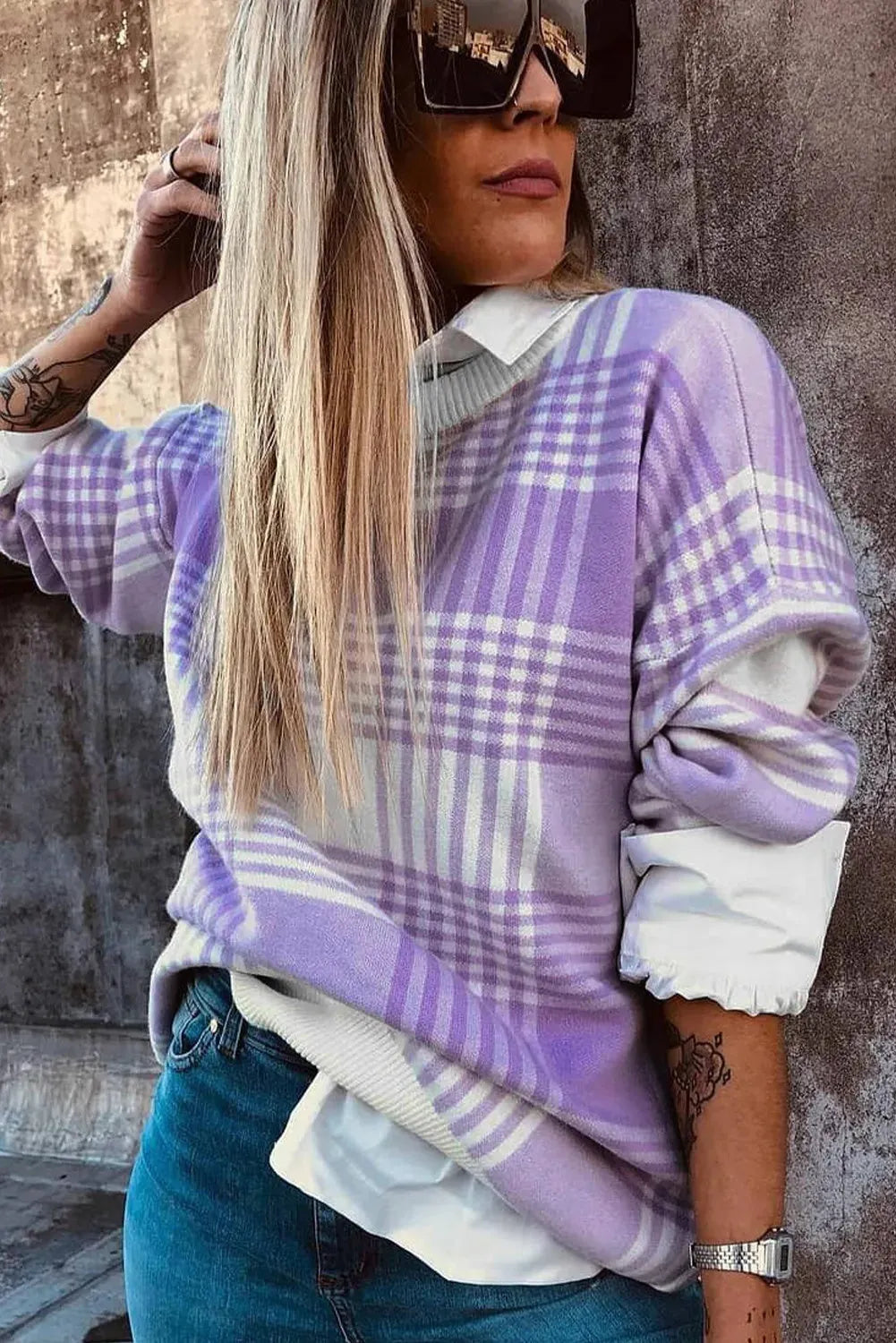 Lilac plaid print loose sweater with ribbed trim and long sleeves, shown in a relaxed fit.