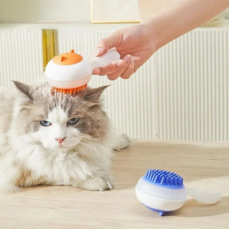 Blue automatic pet bath brush with soft gel head and hair removal comb on a white background.