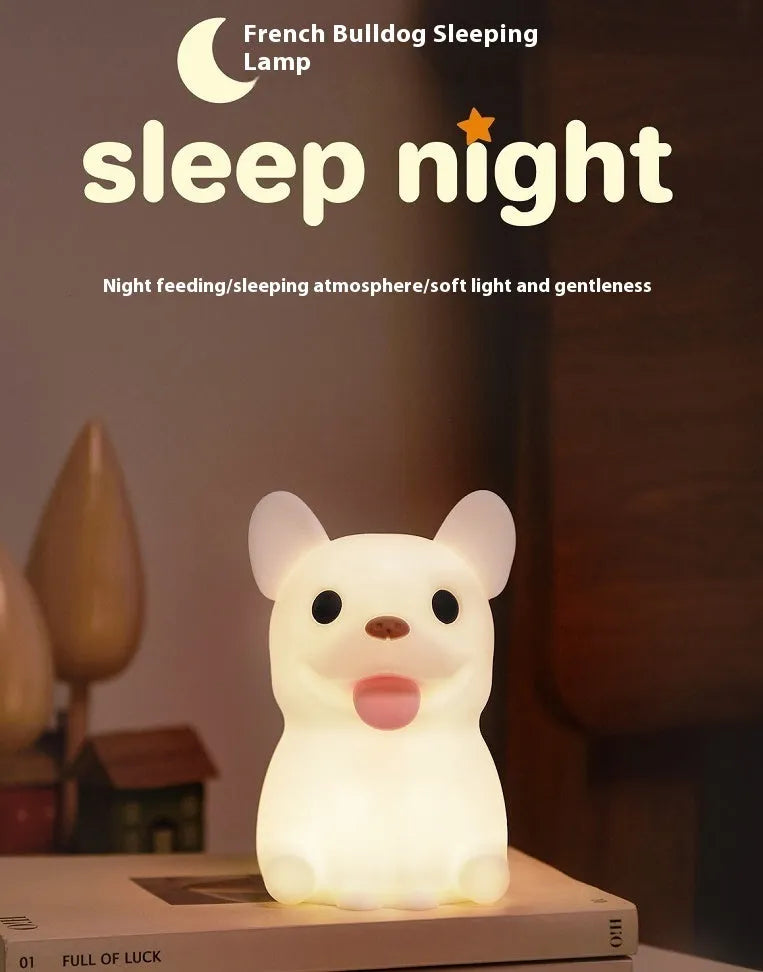 Silicone cartoon bull night light with USB port for charging and dimming controls.