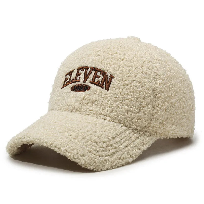Adjustable winter baseball cap in polyester fabric with machine embroidery detailing