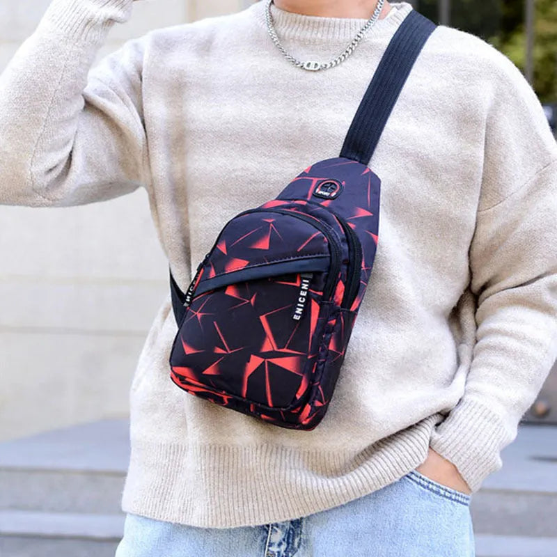 Men's crossbody chest sling bag in blue with earphone hole, zipper pockets, and soft handle, measuring 17x30x5cm