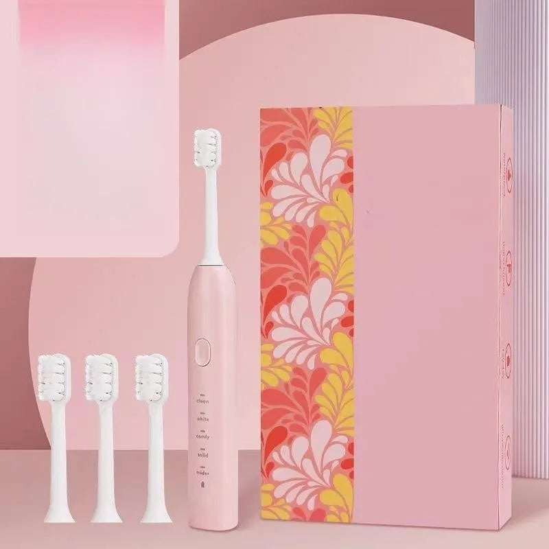 Yellow duck designed rechargeable electric toothbrush with USB port and soft bristle head.