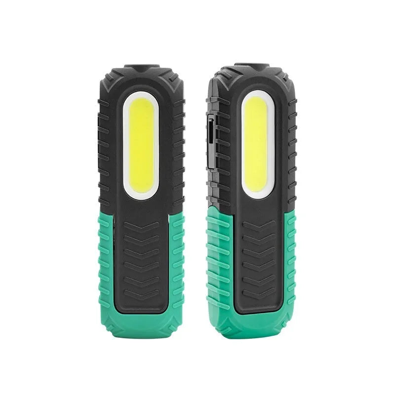 Black and green USB rechargeable auto repair work light with a durable plastic housing.