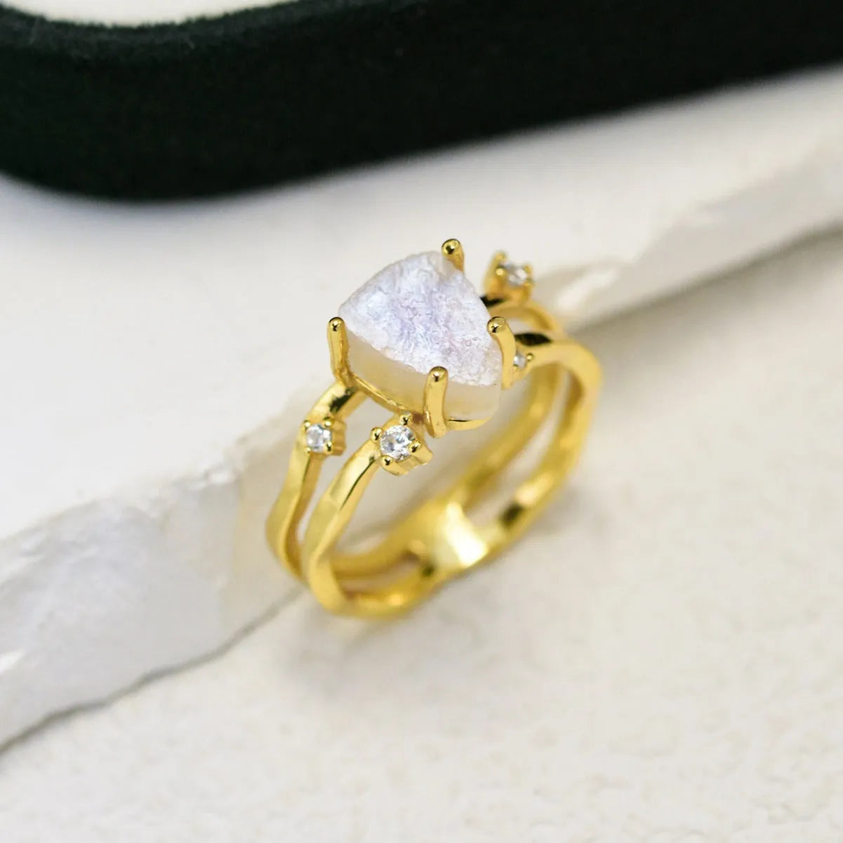 S925 sterling silver irregular triangle moonstone ring in rose gold finish on a hand