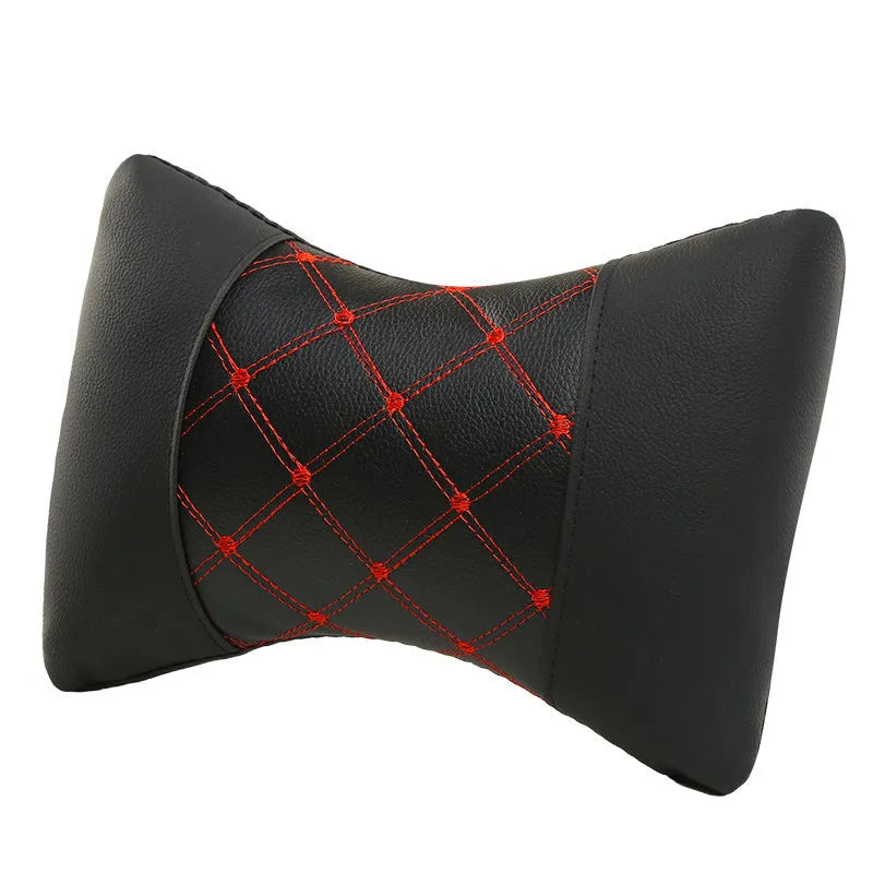 Black quilted car headrest with diamond pattern and contrasting stitching for cervical neck support