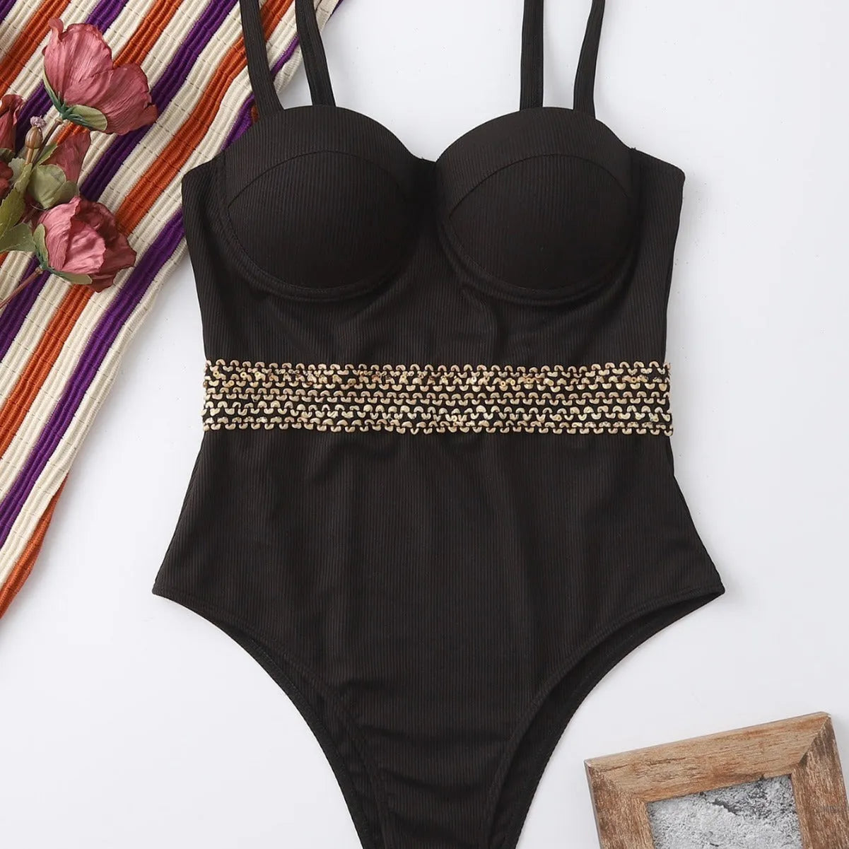 Black one-piece swimsuit with adjustable shoulder straps for women in polyester fabric