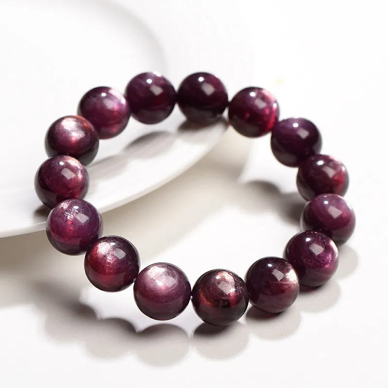 Purple lepidolite crystal bead bracelet with polished round beads in natural colour, showing size options from 6mm to 15mm diameters