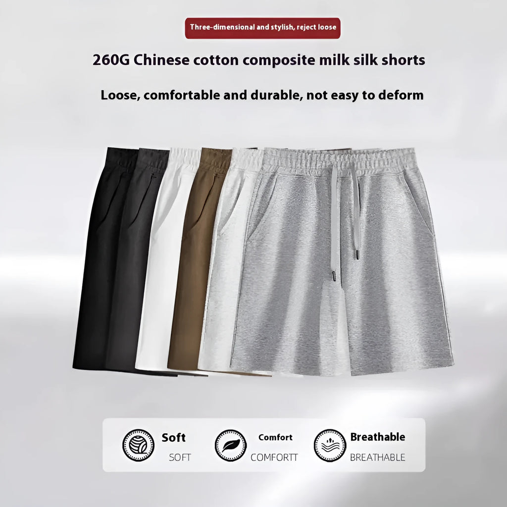Straight-leg cotton sports shorts in light grey on a mannequin, showing the casual fit.