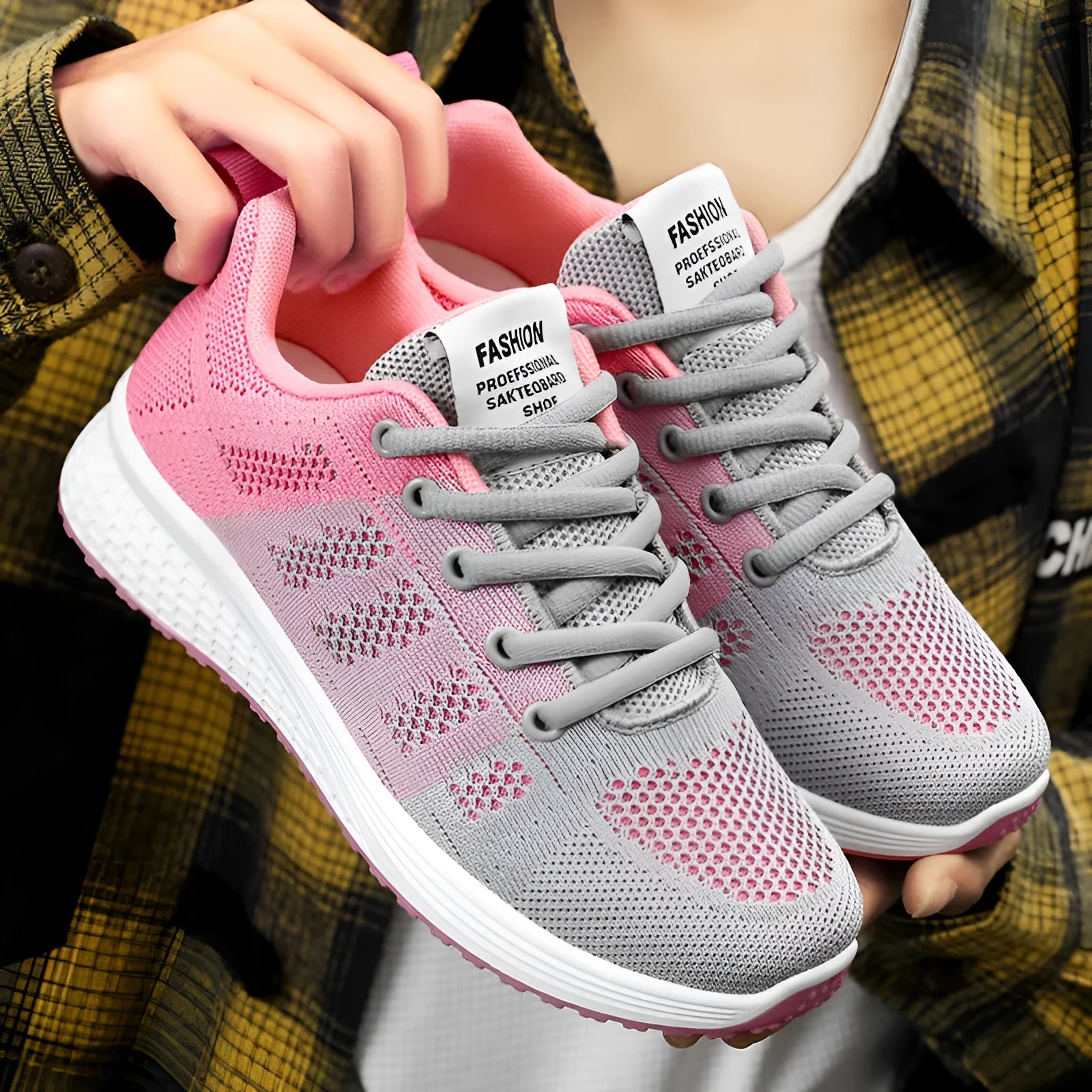 Women's Flyknit running shoes in black, rose red, or grey pink with a flat heel and lace-up front.