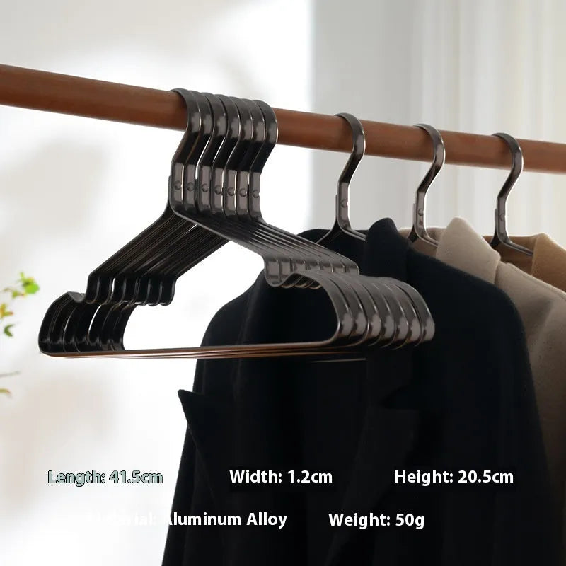 Elegant black modern clothes hanger with non-slip surface for secure garment storage