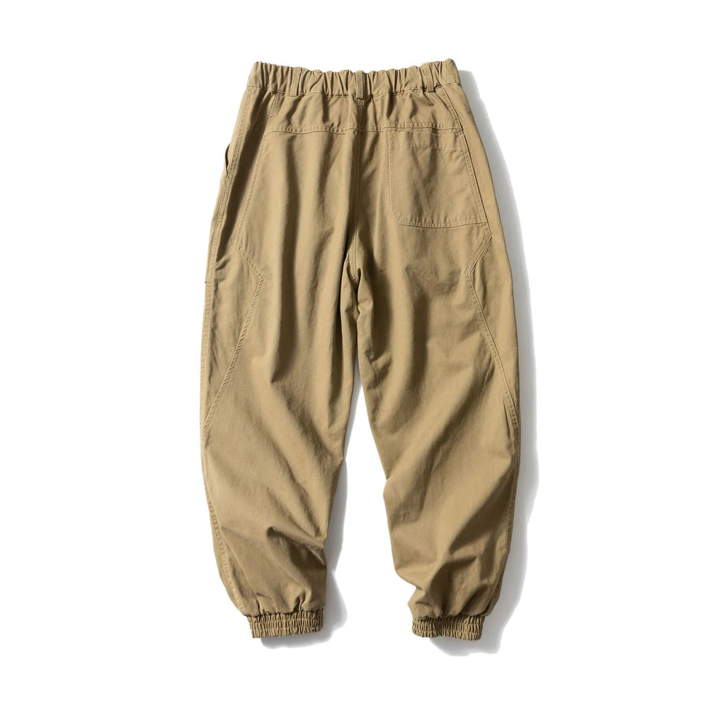 Cotton casual trousers with large side pockets and tapered legs in black colour