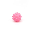 Four colourful spiked dog balls with 2-inch diameter, designed for small breed dental chew and fetch games